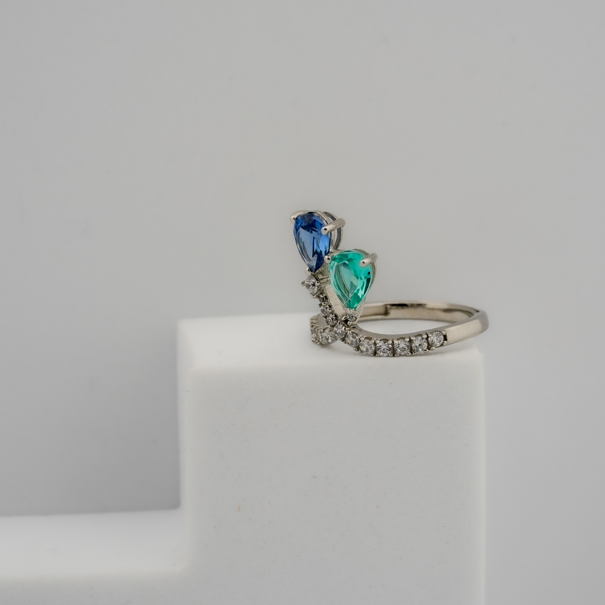 Pear cut blue green stone ring