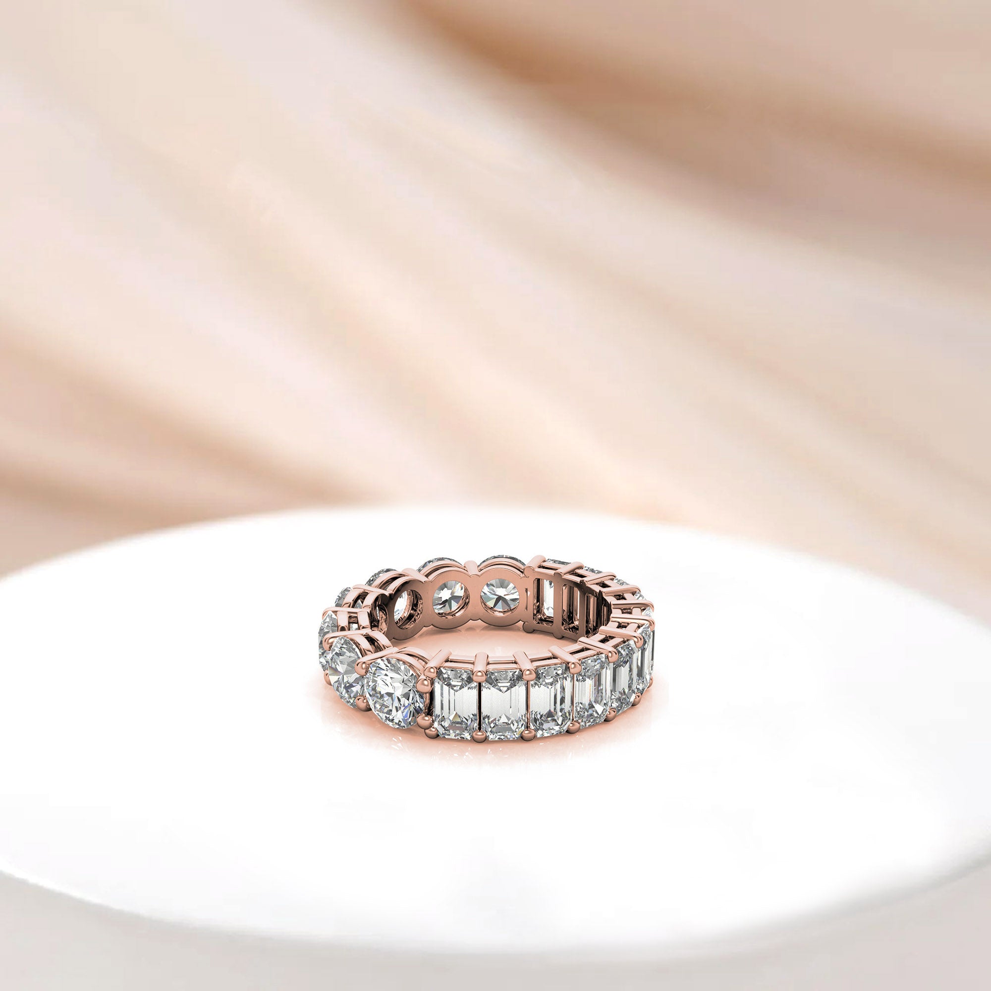 Sterling Silver Elegant Shimmering Round And Emerald Cut Diamonds Rose Gold Eternity Band For Women