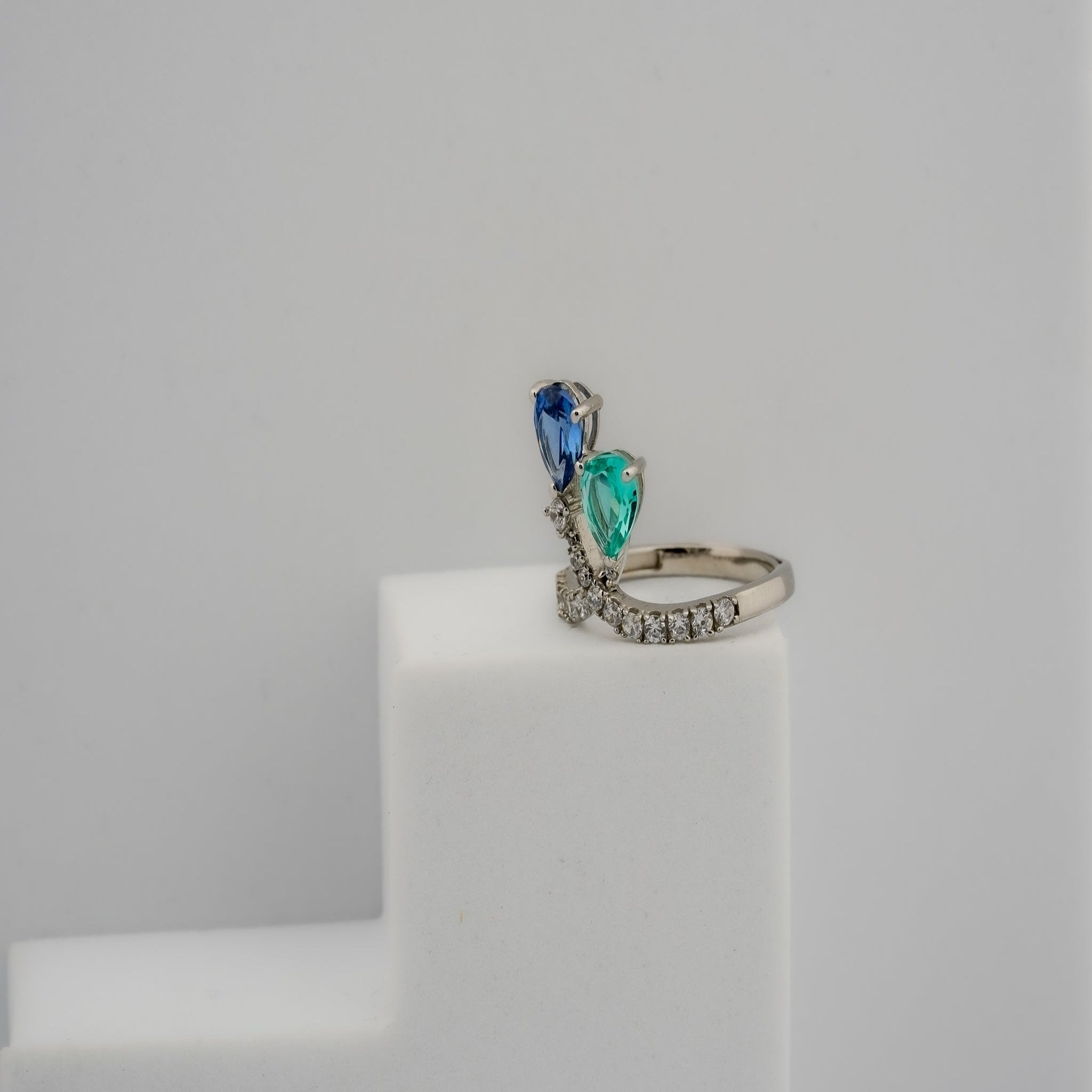 Pear cut blue green stone ring